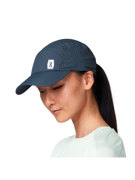Czapka do biegania ON RUNNING Lightweight Cap granatowy
Czapka do biegania ON RUNNING Lightweight Cap granatowy