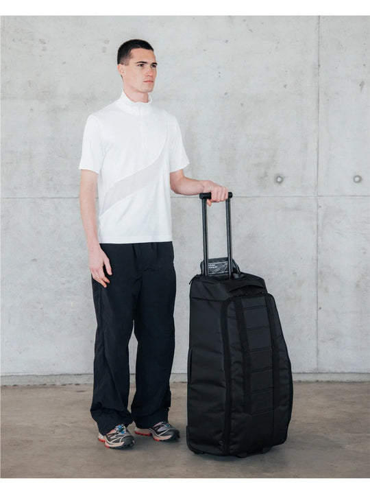 Torba podróżna na kółkach Db™ Hugger Roller Bag Check-In 60L czarny
Torba podróżna na kółkach Db™ Hugger Roller Bag Check-In 60L czarny