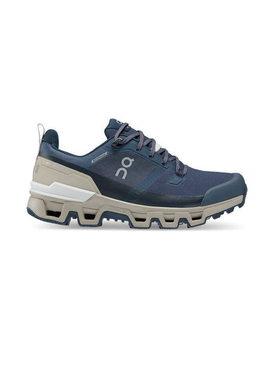 Buty trailowe damskie On W Cloudwander Waterproof granatowo/beżowe
Buty trailowe damskie On W Cloudwander Waterproof granatowo/beżowe