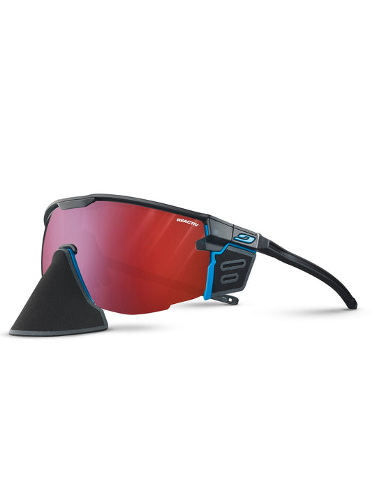 Okulary fotochromowe Julbo Ultimate Cover - czarno niebieski | Reactiv High Contrast cat 0-3 - L - Adventure Sports
Okulary fotochromowe Julbo Ultimate Cover - czarno niebieski | Reactiv High Contrast cat 0-3 - L - Adventure Sports