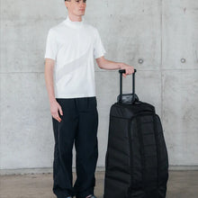 Torba podróżna na kółkach Db™ Hugger Roller Bag Check-In 90L czarny
Torba podróżna na kółkach Db™ Hugger Roller Bag Check-In 90L czarny