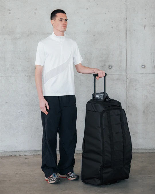 Torba podróżna na kółkach Db™ Hugger Roller Bag Check-In 90L czarny
Torba podróżna na kółkach Db™ Hugger Roller Bag Check-In 90L czarny