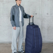 Torba podróżna na kółkach Db™ Hugger Roller Bag Check-In 90L niebieski
Torba podróżna na kółkach Db™ Hugger Roller Bag Check-In 90L niebieski