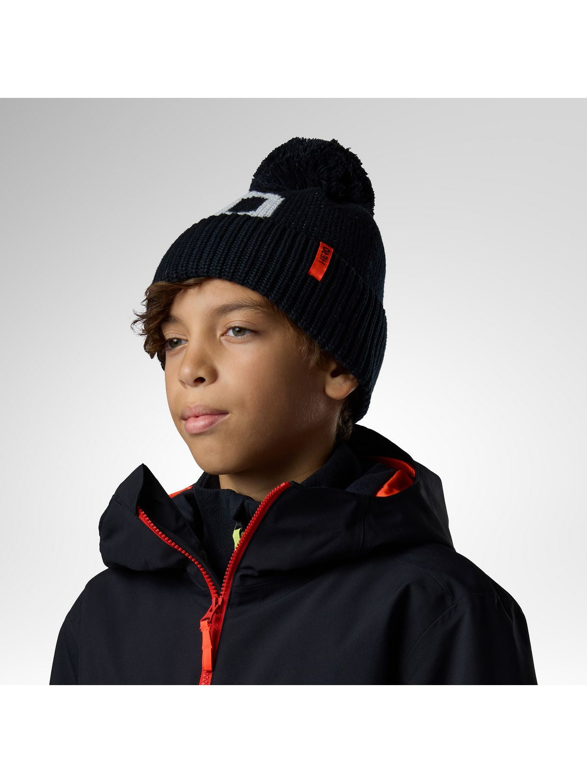 Czapka juniorska ROSSIGNOL Jr Hero Pompom Beanie czarna
