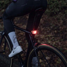 Lampka rowerowa BOOKMAN Curve Rear Light 37lm pomarańczowy
