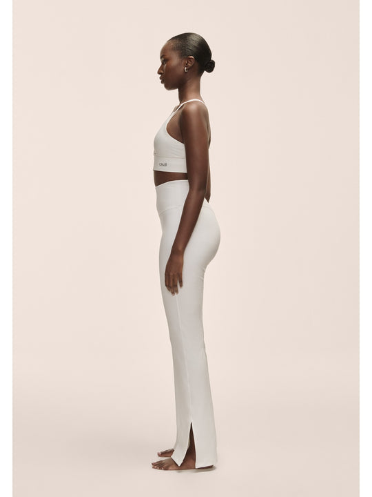 Legginsy damskie Casall Grace Flare Slit Pant biały - Adventure Sports
