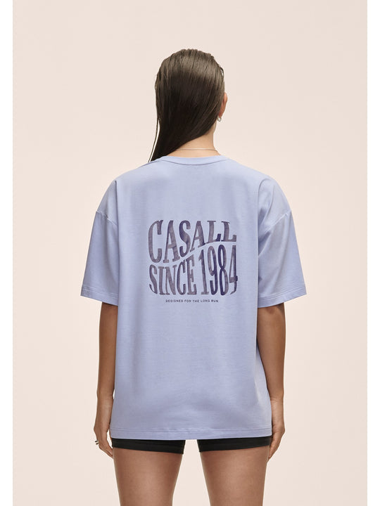 Koszulka damska Casall Oversized Cotton Blend Tee lawendowa - Adventure Sports
