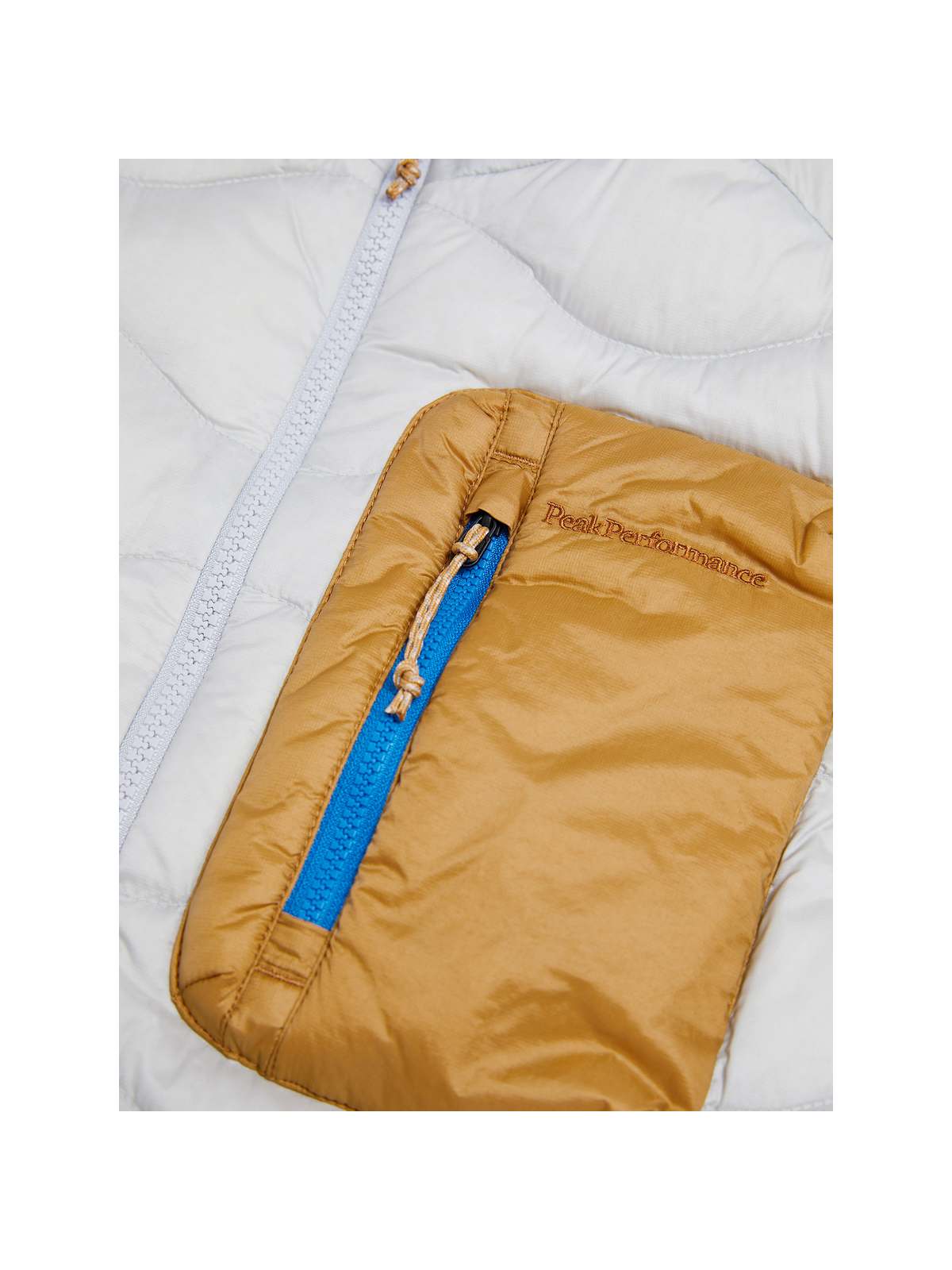 Kamizelka PEAK PERFORMANCE W Helium Utility Down Vest biały