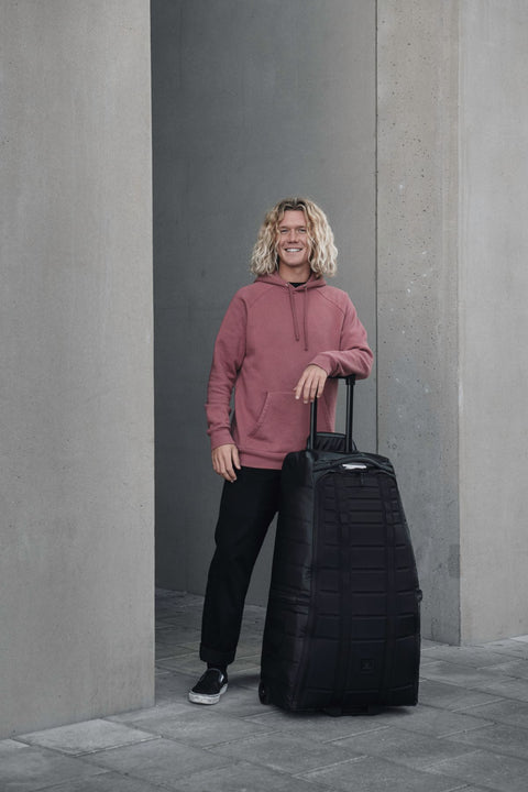 Torba podróżna na kółkach Db™ Hugger 1st Generation Roller Bag 90L czarny
