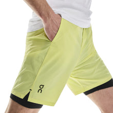 Szorty do biegania On Performance Hybrid Short żółty
