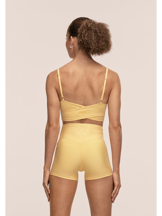 Legginsy treningowe damskie CASALL Ultra High Waist Hot Pant kolor żółty

