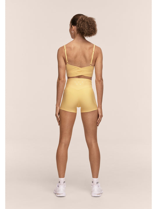 Legginsy treningowe damskie CASALL Ultra High Waist Hot Pant kolor żółty
