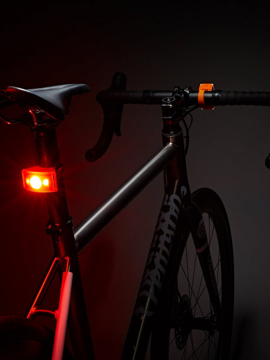 Lampka rowerowa BOOKMAN Curve Rear Light 37lm pomarańczowy
