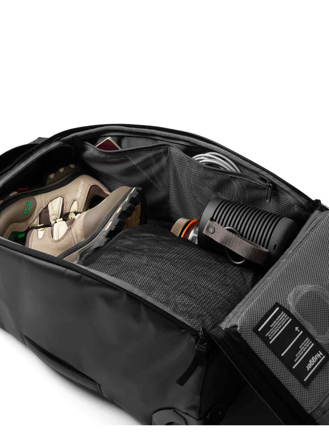 Torba podróżna na kółkach Db™ Hugger Roller Bag Carry-On 40L czarny
