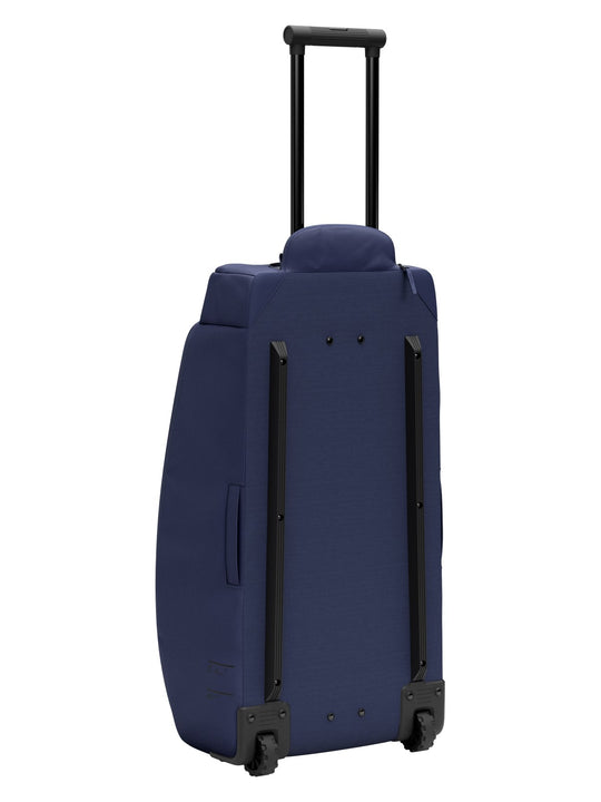 Torba podróżna na kółkach Db™ Hugger Roller Bag Check-In 60L niebieski
